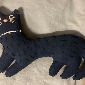Handmade embroidered plush cat
