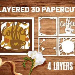 Könnte beinhalten: Vierlagiges Papier-Schnittmuster mit einer Kaffeetasse mit Herzen und dem Wort "Kaffee" in einem braunen und weißen Farbschema.