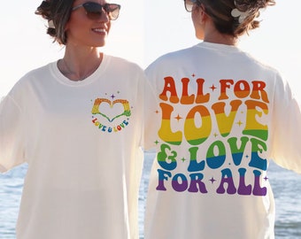 May include: White t-shirt with a rainbow heart and the text "Love & Love" on the front and the text "All for Love & Love for All" on the back.