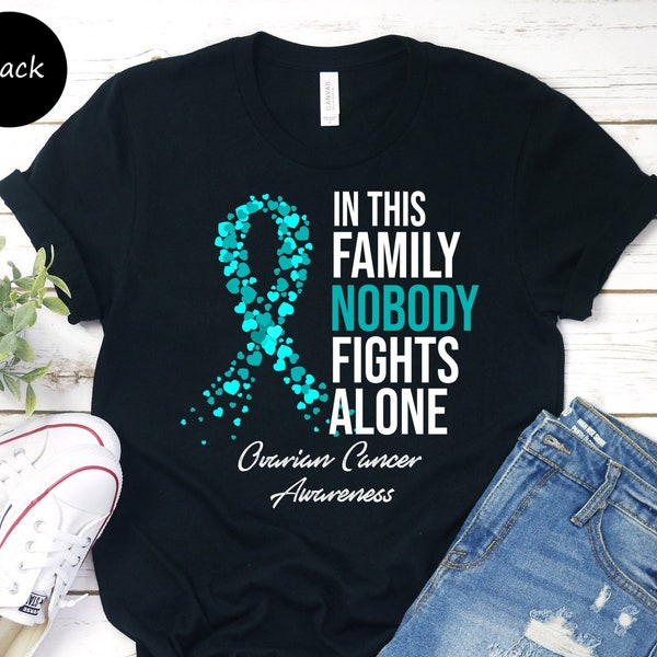 Camiseta unissex de conscientização sobre o câncer de ovário, camiseta Nesta família ninguém luta sozinho, lutadora contra o câncer de ovário, guerreira do câncer de ovário