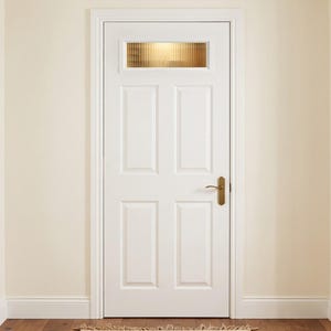 May include: A white four-panel interior door featuring a rectangular window at the top with vertical reeded glass. The door is framed by white molding and includes a brass-colored lever handle mounted on the right side of the door panel.