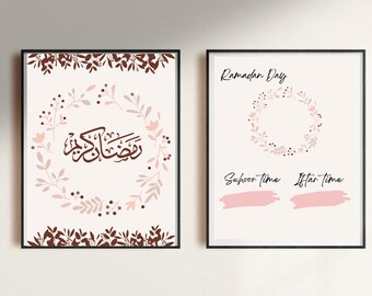 May include: Two printable posters with a floral wreath design. The first poster features the Arabic text "Ramadan Kareem" in brown calligraphy. The second poster says "Ramadan Day" and has two blank spaces for writing in the times for Suhoor and Iftar.