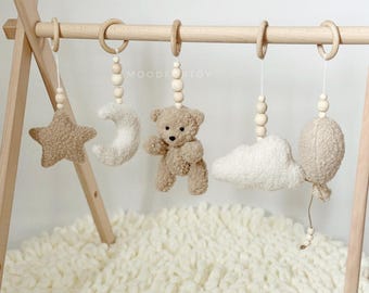 Boucle Baby Gym: Brinquedos sensoriais de urso, lua e estrela