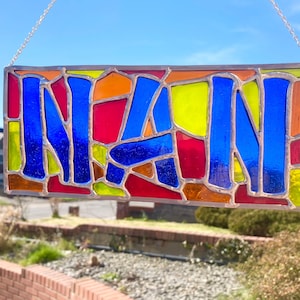 Stained Glass &#39;NAN&#39; Leaded Hanging Panel: Colorful Art