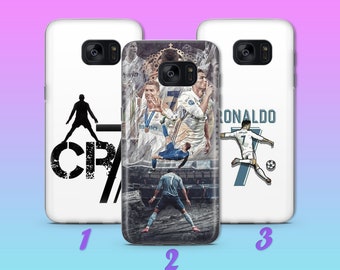 May include: Three different phone cases featuring Cristiano Ronaldo, a famous soccer player. The first case has a black and white image of Ronaldo with the text "CR7". The second case has a colorful image of Ronaldo in action with the text "RONALDO". The third case has a simple image of Ronaldo with the text "RONALDO".
