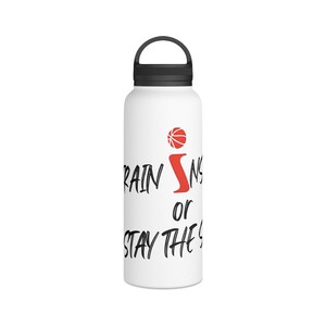 May include: White water bottle with a black handle and lid. The bottle features the text "TRAIN INSANE or STAY THE SAME" in black, with a red "i" and a basketball graphic above it. A sports-themed water bottle.