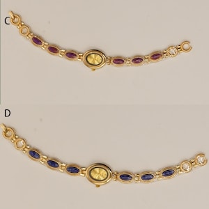 Puede incluir: Dos relojes de pulsera dorados. Uno presenta una esfera ovalada dorada y una correa con piedras ovaladas moradas. El otro reloj tiene una esfera ovalada dorada y una correa con piedras ovaladas azules. Ambos relojes tienen un cierre.