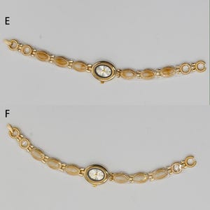 Puede incluir: Un reloj de pulsera dorado con una esfera ovalada y una correa con piedras ovaladas de color claro. La esfera del reloj tiene un fondo blanco con manecillas negras y detalles dorados. La correa es de metal dorado.