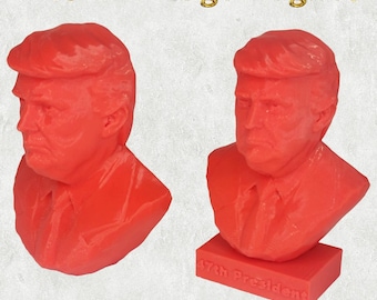 May include: Red fridge magnet shaped like a bust of a man with the text "TRUMP Fridge Magnet" in gold letters. The bust is on a rectangular base with the text "47th President".