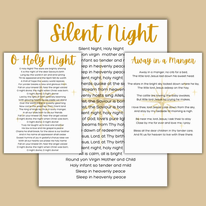 May include: Three Christmas carols are displayed on white paper: "Silent Night," "O Holy Night," and "Away in a Manger." The text is in a classic serif font, with the title "Silent Night" in a gold, decorative font.
