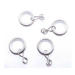 May include: Four silver curtain rings with a hook attached to each ring. The rings are approximately 2.5 cm in diameter.