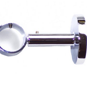 May include: Chrome curtain rod bracket with a round ring and a flat base.