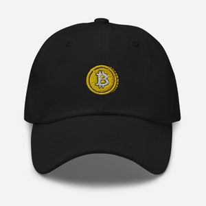 May include: A black baseball cap with a gold embroidered Bitcoin logo.