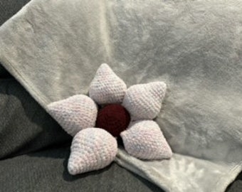 Cuscino a fiori all'uncinetto