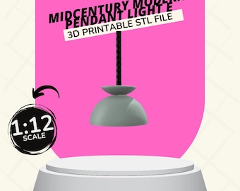 Op de afbeelding: Een grijze, koepelvormige hanglamp met een zwart snoer, met het label "Midcentury Modern Pendant Light 3D Printable STL File". De afbeelding bevat een 1:12 schaalindicator, wat wijst op een miniatuurmodel. De achtergrond is roze.