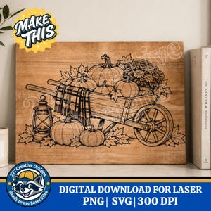 May include: A laser-engraved wooden board featuring a black line art illustration of a wooden wheelbarrow filled with pumpkins, autumn leaves, and a bouquet of flowers. A plaid blanket hangs over the side, and a vintage lantern sits nearby.