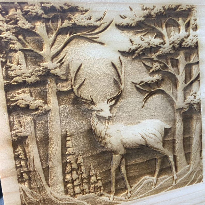 May include: A wood carving of a deer standing in a forest. The deer has large antlers and is facing to the right. The forest is made up of tall trees with branches and leaves. The carving is detailed and realistic.