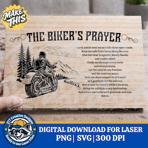 May include: Wooden plaque with the text "The Biker's Prayer" and a motorcycle graphic. The design includes a biker on a motorcycle, trees, mountains, and a road. The plaque also features a prayer.