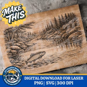 May include: Wooden laser-cut design featuring a detailed river scene with a jumping fish. The artwork includes trees, rocks, and water reflections. The text "MAKE THIS" is in a starburst, and the bottom text reads "DIGITAL DOWNLOAD FOR LASER PNG | SVG | 300 DPI".