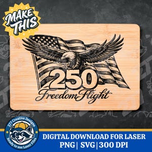 May include: A rectangular wooden cutting board with a laser-etched design featuring an American flag, an eagle with outstretched wings, and the text "250 Freedom Flight." The design is in black against the light wood.