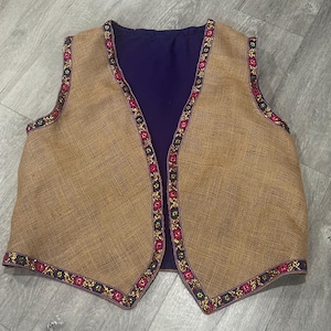 San Lazaro, burlap vest