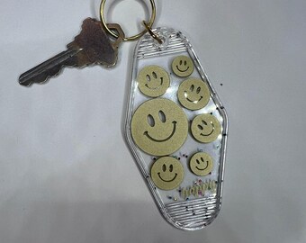 Portachiavi con faccina sorridente per hotel