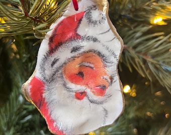 Ornamento natalizio vintage a forma di conchiglia di ostrica con volto di Babbo Natale
