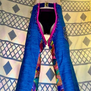 Hand-made hand painted two-toned denim chaps with corduroy bordering and colourful trim