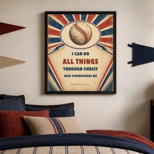 May include: A framed wall poster featuring a baseball graphic centered above the text I CAN DO ALL THINGS THROUGH CHRIST WHO STRENGTHENS ME PHILIPPIANS 4:13, set against a red, white, and blue sunburst background with a vintage distressed texture.
