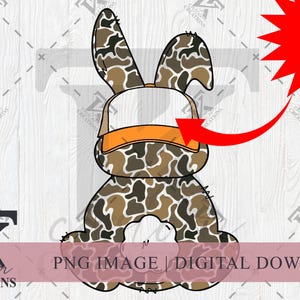 May include: A cartoon bunny wearing a camouflage pattern and a white baseball cap with an orange brim. The cap has a blank space where you can add text. The text "Your Name Here" is in a red starburst shape.