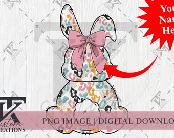 May include: A digital download of a colorful bunny with a pink bow. The bunny is wearing a leopard print pattern. The image is ready to be personalized with a name.