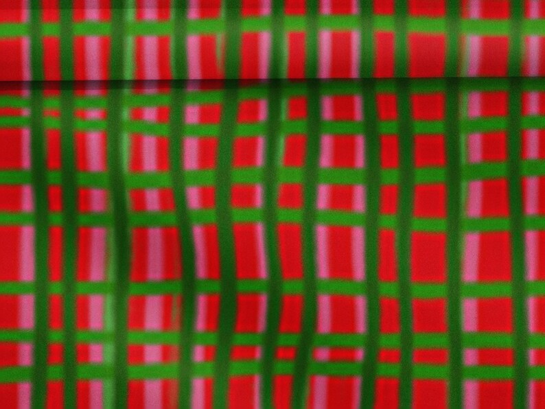 May include: Abstract fabric pattern featuring a grid of vertical and horizontal lines. The design incorporates a vibrant color palette of red, green, and pink, creating a visually dynamic and modern aesthetic. The fabric's texture appears soft and flowing.