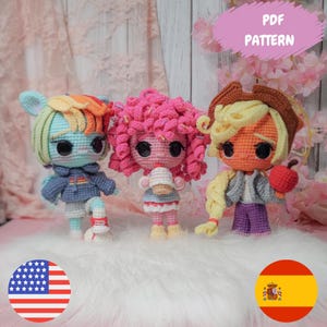 May include: Three handmade crochet dolls with large eyes and colorful hair. One doll has a blue and rainbow hair, another has pink curly hair, and the third has blonde hair and a brown hat. The dolls are wearing outfits and holding accessories. The image includes the text "PDF PATTERN".