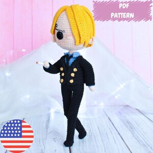 May include: Crochet pattern for a yellow-haired character wearing a black suit with gold buttons and a blue shirt. The pattern is available as a PDF download.  PDF PATTERN.