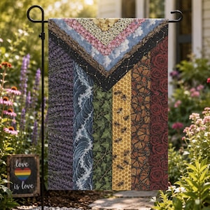 May include: A garden flag with a colorful, segmented design. The flag features sections of lavender, ocean waves, ivy, honeycomb with bees, butterflies, and roses. The top section includes flowers, clouds, and a starry night design.