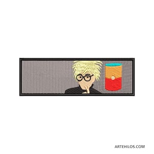 May include: Embroidered patch featuring a portrait of a man with blonde hair and glasses, wearing a black turtleneck, and a red and yellow can with a blue top.
