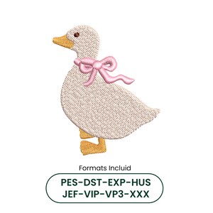 Puede incluir: Un diseño de bordado de un pato de color beige claro con pico y patas amarillas, que lleva un lazo rosa alrededor del cuello. Debajo del pato, el texto dice: Formats Incluid PES-DST-EXP-HUS JEF-VIP-VP3-XXX.