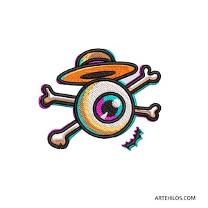 May include: Embroidered patch featuring a cartoon eye wearing a hat, with crossed bones and a small bat underneath. The eye is yellow with a blue iris and pink pupil. The hat is orange and the bones are white with pink outlines.
