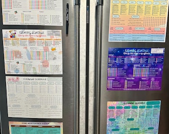 May include: A stainless steel refrigerator with five magnetic cleaning schedule charts and a black dry erase marker attached to the front. The charts feature various colorful designs, checklists, and monthly tracking grids for household maintenance tasks.