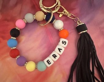 Eras wristlet keychain includes orange Showgirl