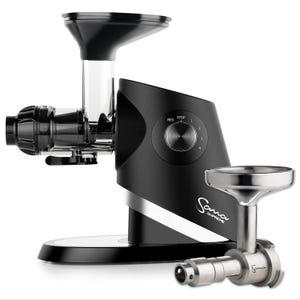 May include: A black and silver Sana Supreme juicer with a clear plastic feeding tube and a stainless steel auger. The juicer has a control dial with settings for reverse, stop, and speeds 1-4. A separate stainless steel juicing attachment is also included.