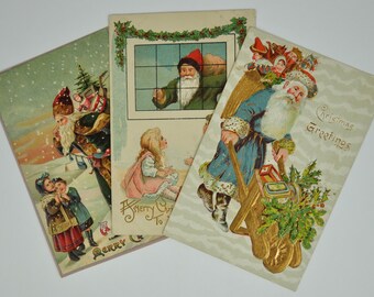 Group of 3 Antique Santa Claus Postcards