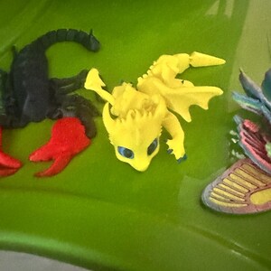 Dragon, scorpion, and flower dragon 3d