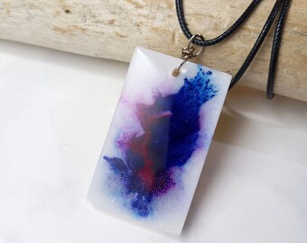 Exclusive handmade purple abstract art style pendant necklace in resin and beads. Reversible jewelry with gold-colored back. Original gift.