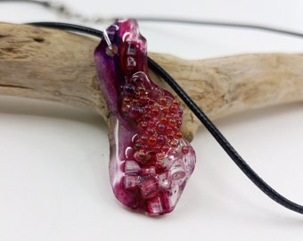 Resin pendant and handmade necklace. Exclusive jewelry with red ink and glass beads. Artisan resin jewelry. Original gift.