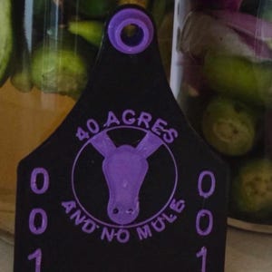 40 Acres and No Mule Cow Ear Tag