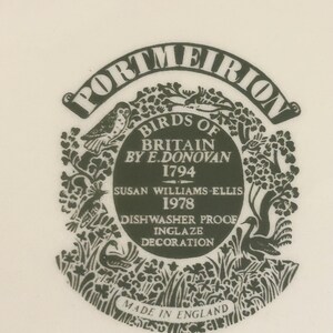 May include: A black and white Portmeirion Birds of Britain label. The label features illustrations of birds, foliage, and text including "Birds of Britain by E. Donovan 1794" and "Dishwasher Proof Inglaze Decoration". The text "Made in England" is also present.