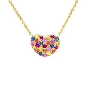 May include: A gold necklace featuring a heart-shaped pendant. The pendant is encrusted with a variety of colorful gemstones, including red, blue, yellow, and purple. The necklace is on a white background.