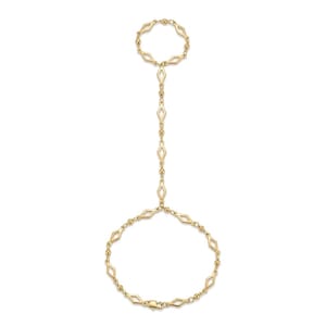 May include: A gold-toned hand chain featuring a circular ring component connected by a vertical chain segment to a larger circular bracelet. The design consists of alternating small round beads and open diamond-shaped metal links throughout.