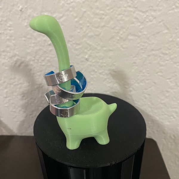 Dino ring holder